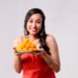 portrait-young-lady-holding-boondi-laddoo-plate-hand